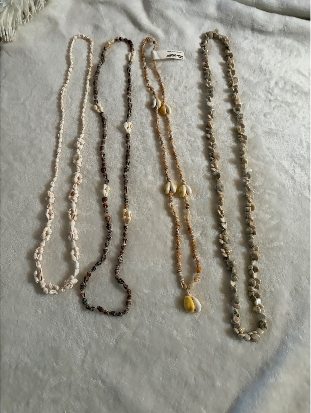 lot of seashell lei necklaces cream brown coral various shapes various shells